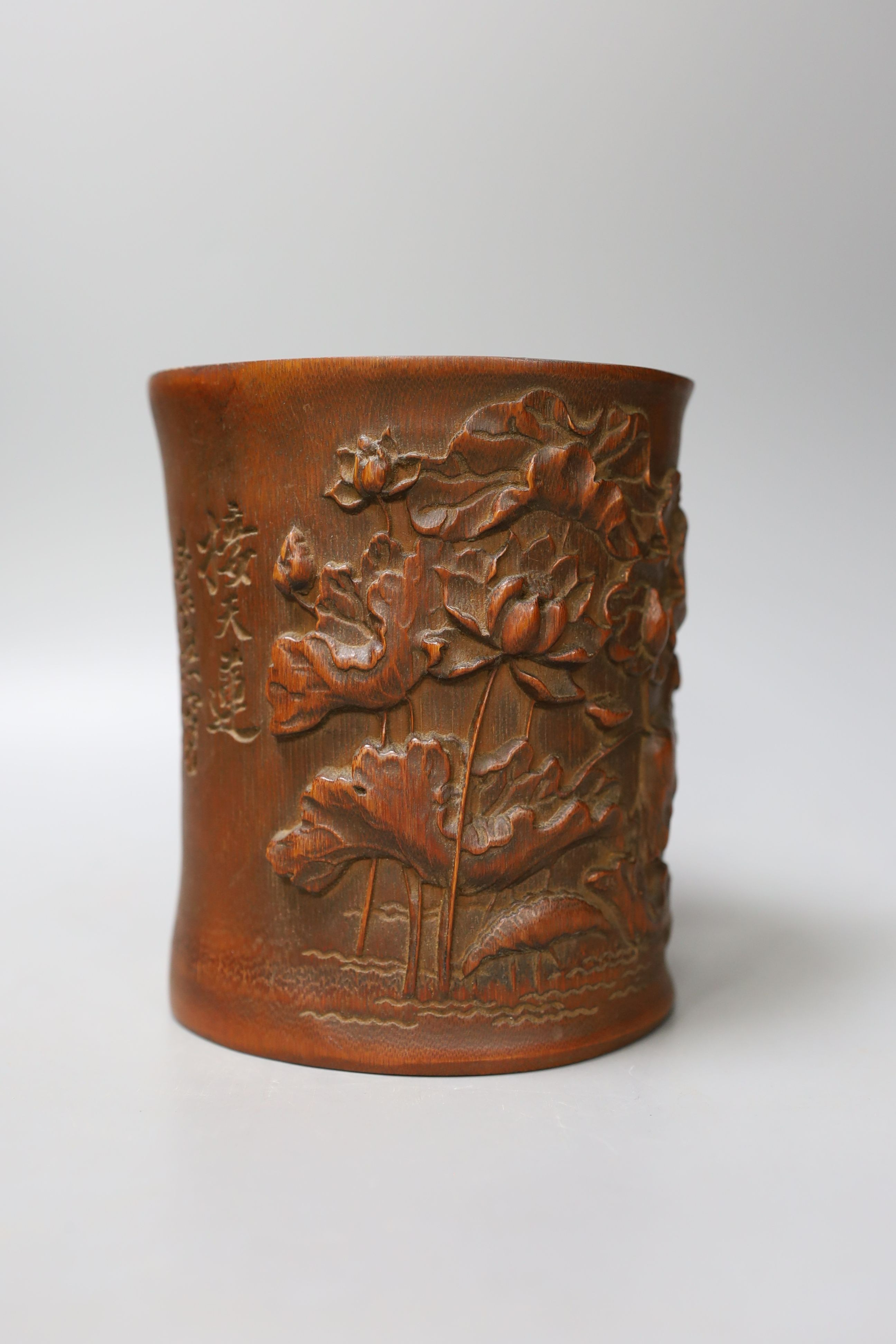 A Chinese carved bamboo brush pot - 15cm tall